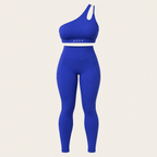A two-piece athletic set consisting of a royal blue one-shoulder sports bra and matching high-waisted leggings, 