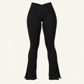 Black high-waisted flared leggings with side slits at the hem, s