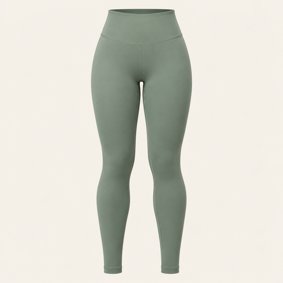 A pair of high-waisted, full-length athletic leggings in a muted sage green color, 